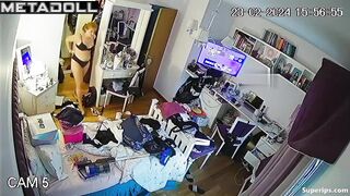 ﻿Redhead girl cleaning her room in her underwear