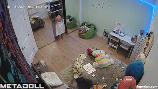 American brunette girl gets dressed slowly