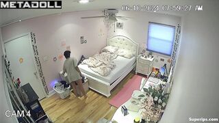 Brunette college girl gets dressed in her room