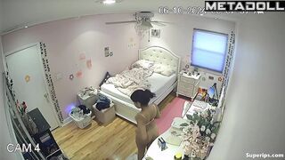Brunette college girl gets dressed in her room