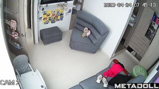 Young busty girl gets dressed in her room