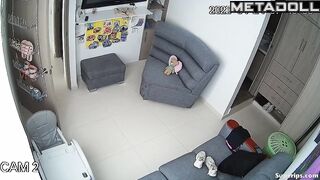 Young busty girl gets dressed in her room