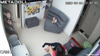 Young busty girl gets dressed in her room