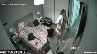 Young Latina sisters change clothes