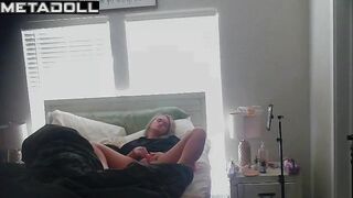 Teenage blonde girl masturbates with a vibrator