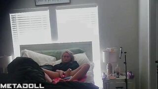 Teenage blonde girl masturbates with a vibrator