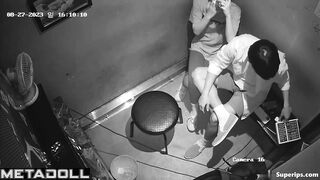 Young Korean couple kissing at karaoke