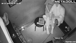 Young Korean couple kissing at karaoke