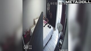 Cute blonde girl gets dressed in her room