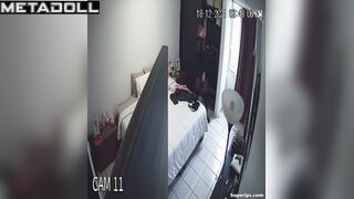 Cute blonde girl gets dressed in her room