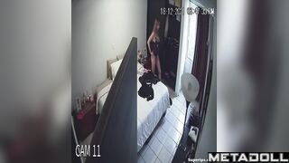 Cute blonde girl gets dressed in her room
