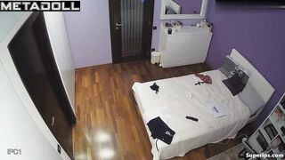 Petite French girl gets dressed in her room