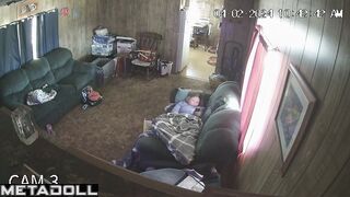 Perverse blonde wife is masturbating on the sofa voyeur IP cam