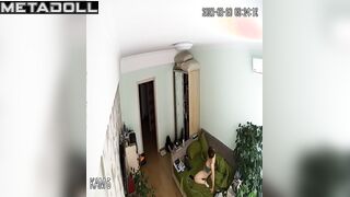 Big tits brunette step-mom is masturbating on the couch voyeur IP cam