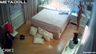 British twin sisters get dressed in their room