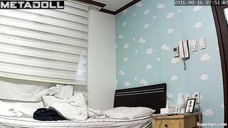 Korean college girl gets dressed in her room