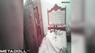 Married couple having sex wildly in their bed