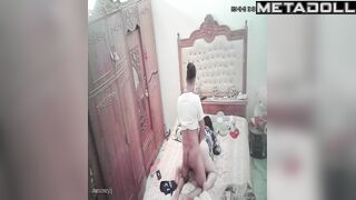 Married couple having sex wildly in their bed