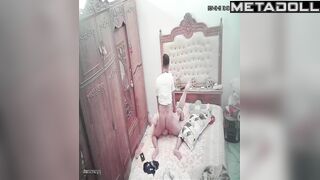 Married couple having sex wildly in their bed