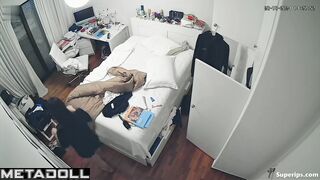 French teenage girl dresses in her room