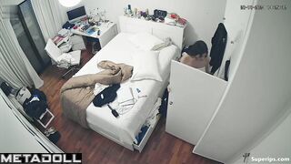 French teenage girl dresses in her room