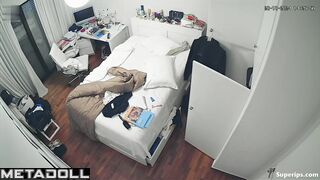 French teenage girl dresses in her room