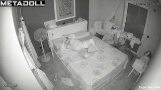 Busty European woman masturbates on her bed