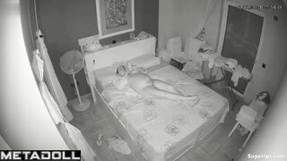 Busty European woman masturbates on her bed