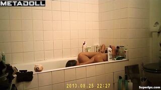 Busty Italian girl masturbates in the bathtub