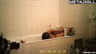 Busty Italian girl masturbates in the bathtub