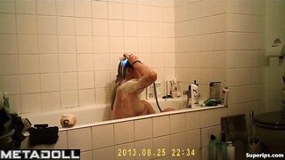Busty Italian girl masturbates in the bathtub