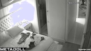 American busty woman is naked in her room
