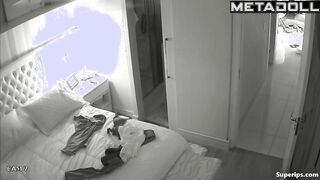 American busty woman is naked in her room