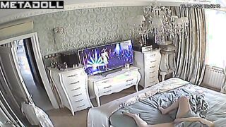 Single brunette MILF is masturbating on the sofa spy IP cam