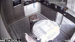 Russian busty mom is naked in her kitchen