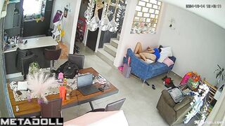 Young couple have sex in their living room