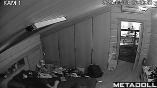 Naked brunette MILF rubs her clitoris while watching porn voyeur IP cam