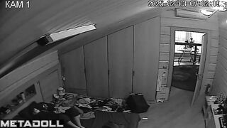 Naked brunette MILF rubs her clitoris while watching porn voyeur IP cam