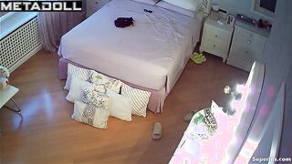Tanned British girl naked in her room