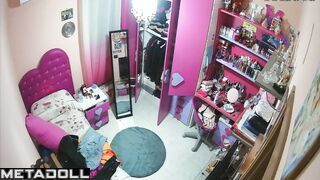 Petite Italian girl gets dressed in her room