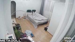 Ukrainian couple naked in their bedroom