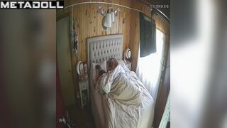 Chubby couple lying under the blanket, hidden video