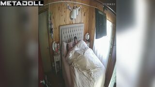 Chubby couple lying under the blanket, hidden video