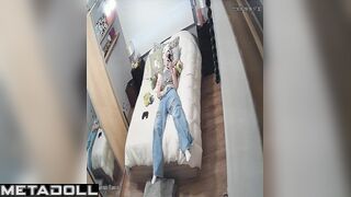 Young lady masturbating without taking off her jeans