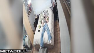 Young lady masturbating without taking off her jeans