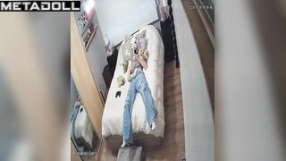 Young lady masturbating without taking off her jeans