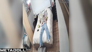 Young lady masturbating without taking off her jeans