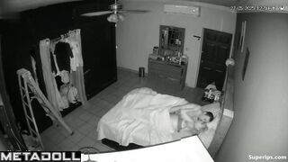 Naked couple kissing passionetly under the blanket