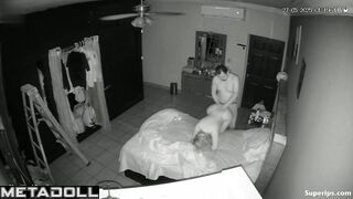 Naked couple kissing passionetly under the blanket