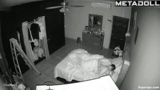 Naked couple kissing passionetly under the blanket